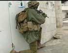 Un soldato israeliano a Ramallah (foto CNN, marzo 2002)